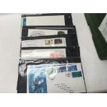 A box containing first day covers