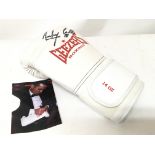 A signed boxing glove by British boxer Anthony Cor