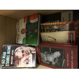 A box containing boxing books mixed titles some vi