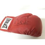 A signed boxing glove by former Heavyweight champi