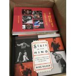A box containing boxing books Stars in the ring Th
