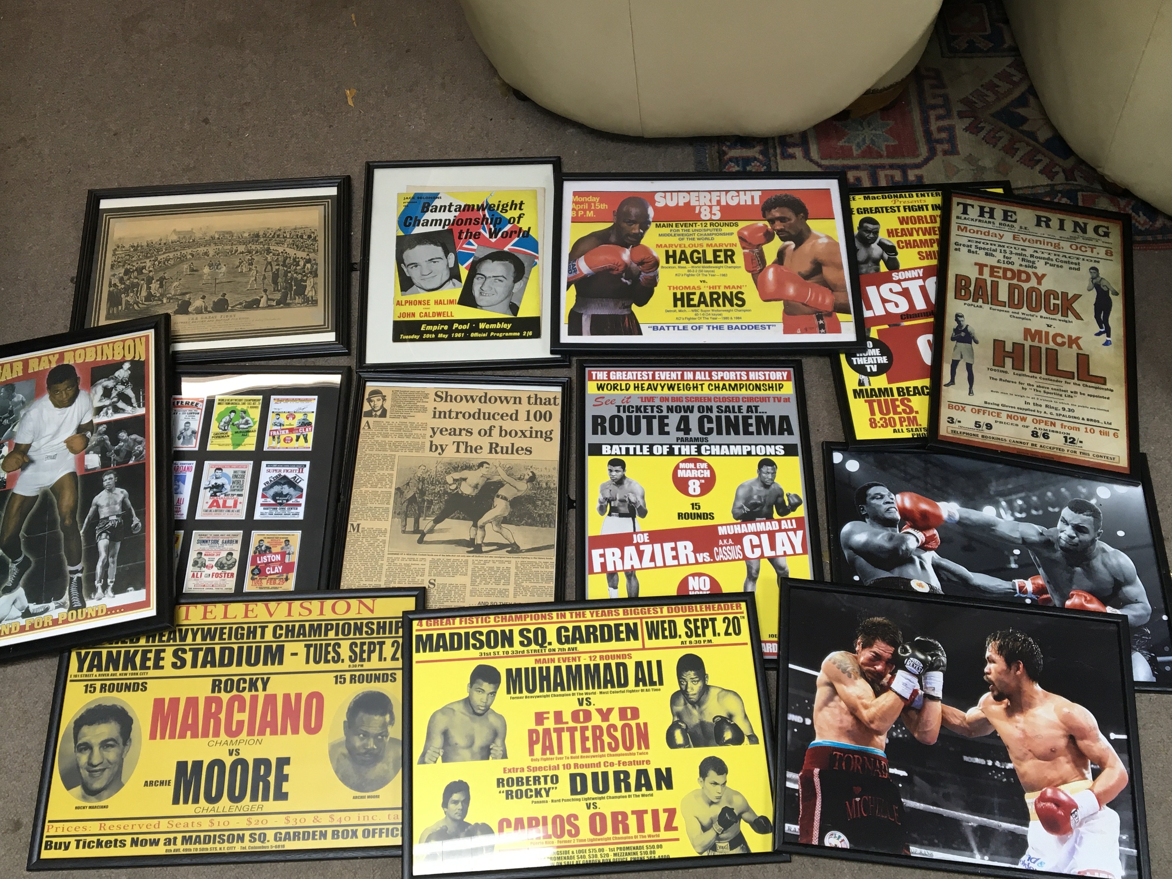 A collection of framed well presented boxing photo