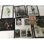 A collection of signed photos and cards boxers fro