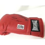 A signed Lonsdale boxing glove unidentified signat
