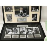 A framed photo Montage Muhammad Ali and Heavy Weig