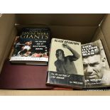A box containing a large quantity of boxing books