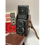 A vintage leather cased Rolleicord TLR camera, wit