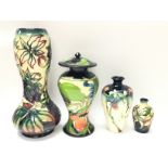 Boxed Moorcroft vases, heights ranging from approx