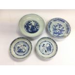 Four blue and white Oriental dishes, largest diame