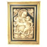 Early Alabaster cased panel of Madonna & a child,