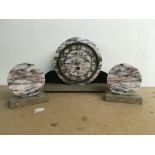 A Art Deco marble clock with garniture . NO RESERV