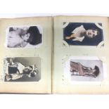 A postcard album of Victorian and later female pho