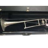 A cased Besson Academy 402 silver plated trombone.