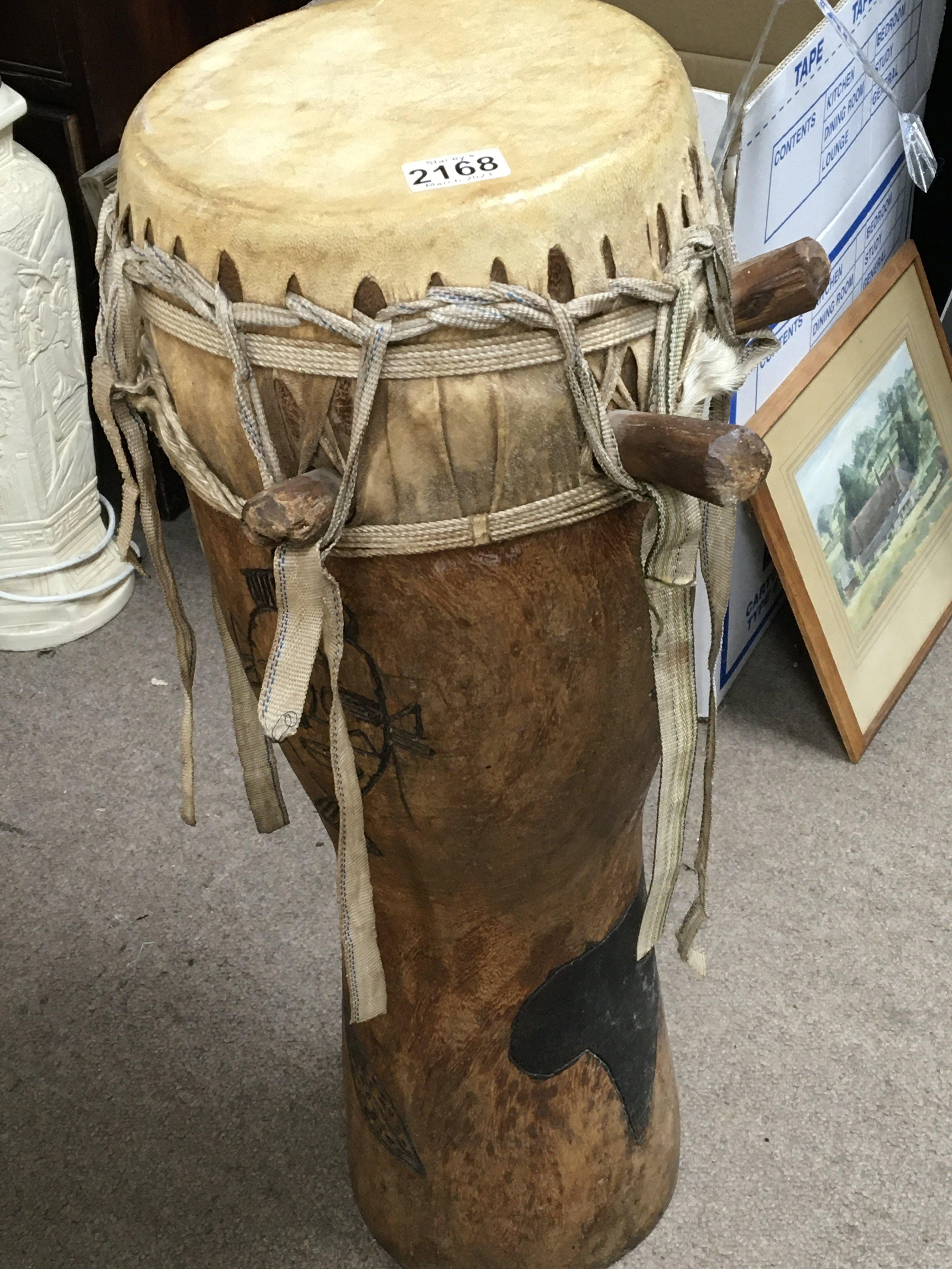 A tribal wood and skin bongo drum height 70cm