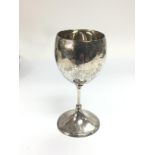 A silver goblet wit engraved decoration, approx 14