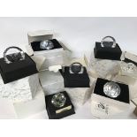 A collection of boxed Swarovski including commemor