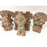 A collection of Aztec type pottery figures Hight 2