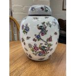 A Limoge porcelain ginger jar and cover. NO RESERV