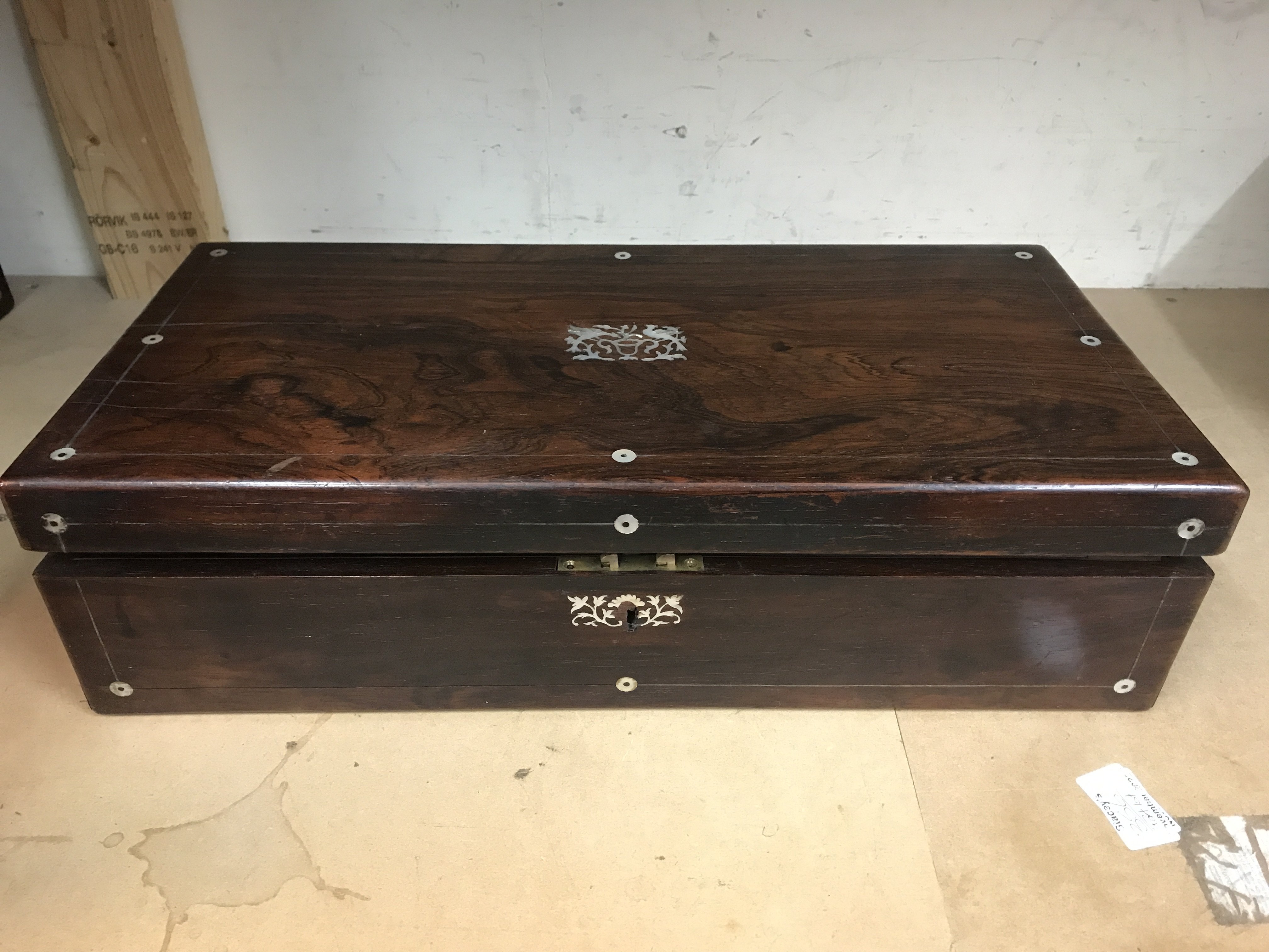 A rosewood Victorian writing slope with fitted int