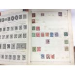 A stamp album containing world stamps including Vi