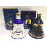 Two boxed ceramic bottles of Commemorative Bell's