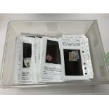 White container with dealer cards, mixed world sta