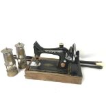 Withdrawn - A singer vintage sewing machine, a pair of Protect