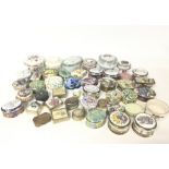 A collection of porcelain & enamel patch boxes by