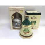 Two boxed ceramic bottles of Bell's whisky includi