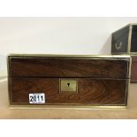 A Victorian rosewood brass bound sewing box with a