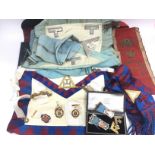 A collection of Masonic items comprising aprons, s