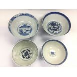 Four blue and white bowls, largest diameter approx