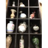 A collection of reproduction Chinese vase in displ