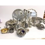 A box of silver plated dinnerware including a cand