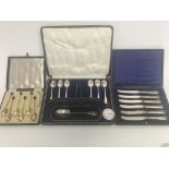 A collection of silver cased flatware including sp