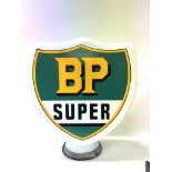 A BP SUPER SHIELD-SHAPED GLASS PETROL PUMP with de