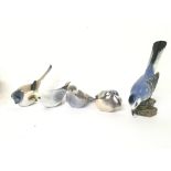 A collection of royal Copenhagen bird ornaments (d