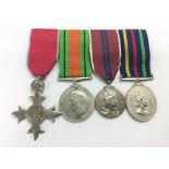Four GB medals comprising an MBE with associated c
