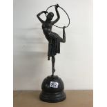 An Art Deco style figure in the form of a dancing