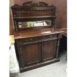 A Victorian walnut Chiffonier with a raised mirror