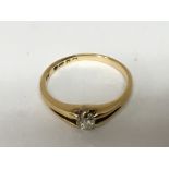 An 18carat gold ring set with a solitaire cushion cut diamonds approximately 0.25-0.3 of a carat