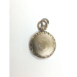 A 9ct gold locket, approx 5.7g. (B7). Shipping cat