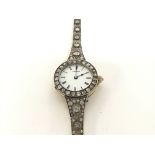 A 14ct gold diamond Longines watch 28.71g total