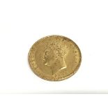 A George IV 1825 full gold sovereign with shield r