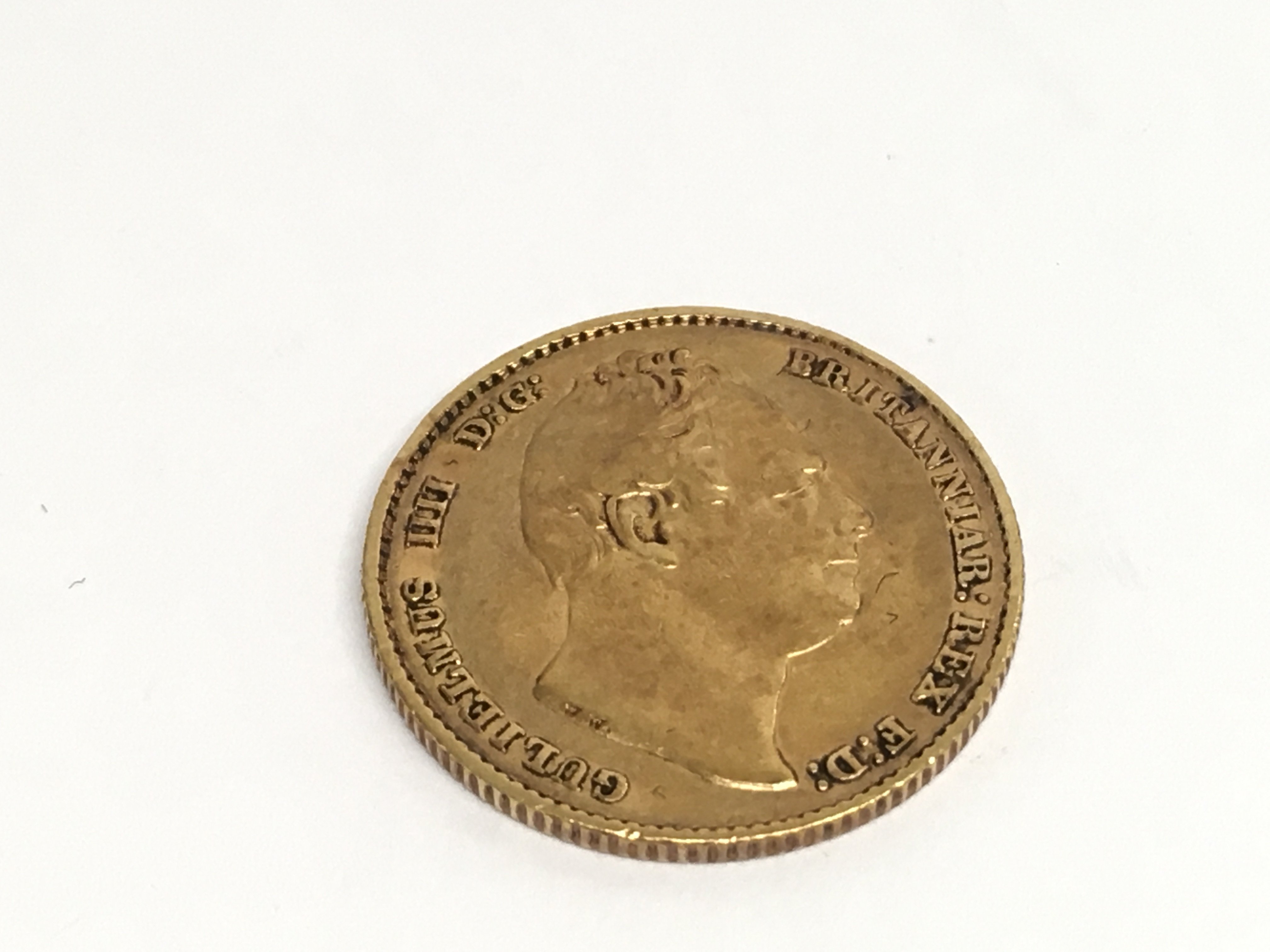 A William IV 1832 full gold sovereign with shield