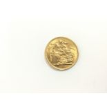A 1912 gold sovereign, approx 7.9g. Shipping categ