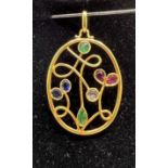 An 18ct yellow gold pendant inset with Sapphires,
