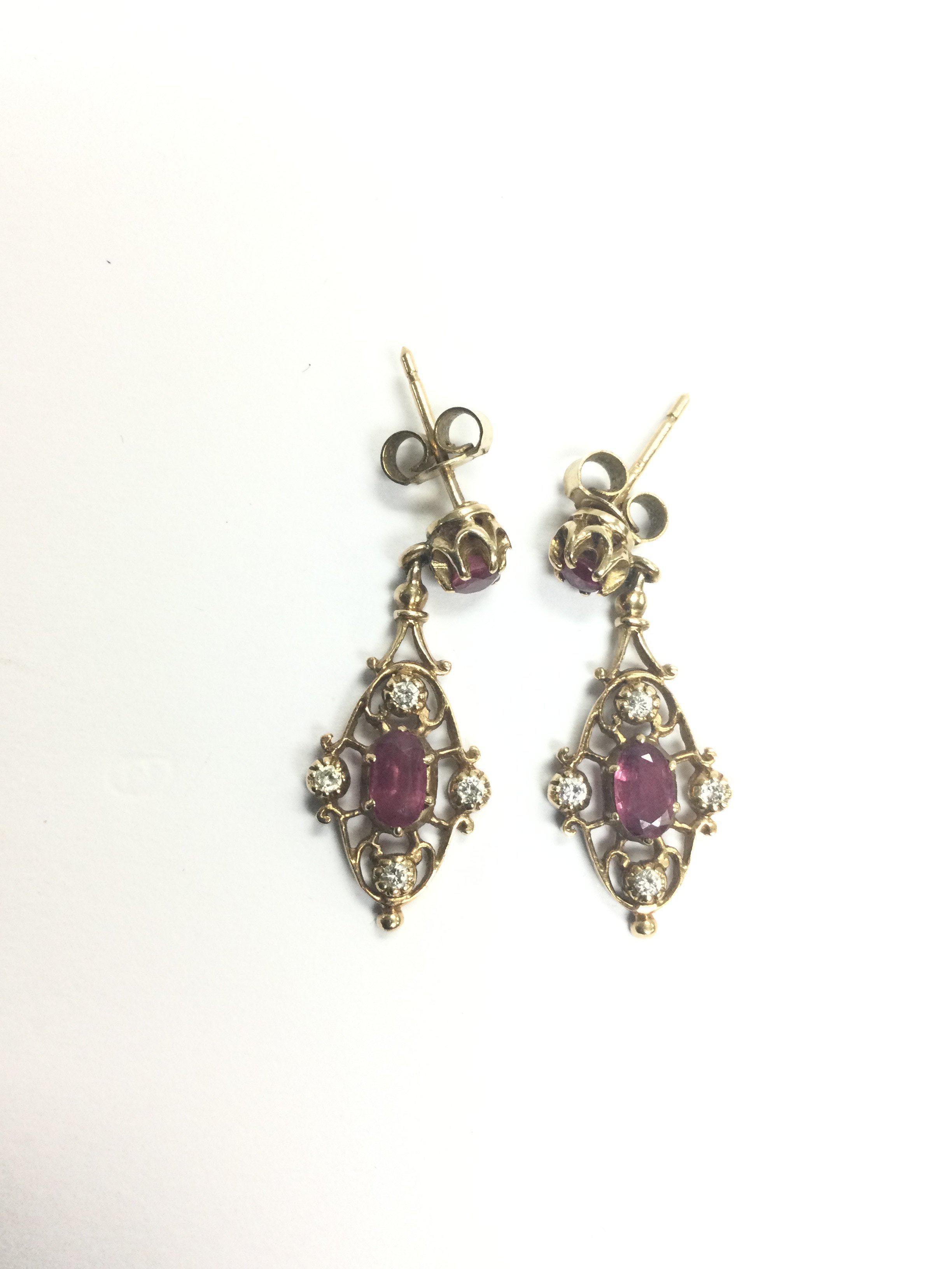 A pair of 9ct gold, diamond and ruby drop earrings