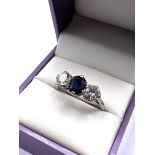A platinum 3 stone Diamond and Sapphire set Ring,