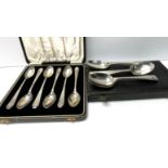 2 halllmarked silver spoon sets. (B)